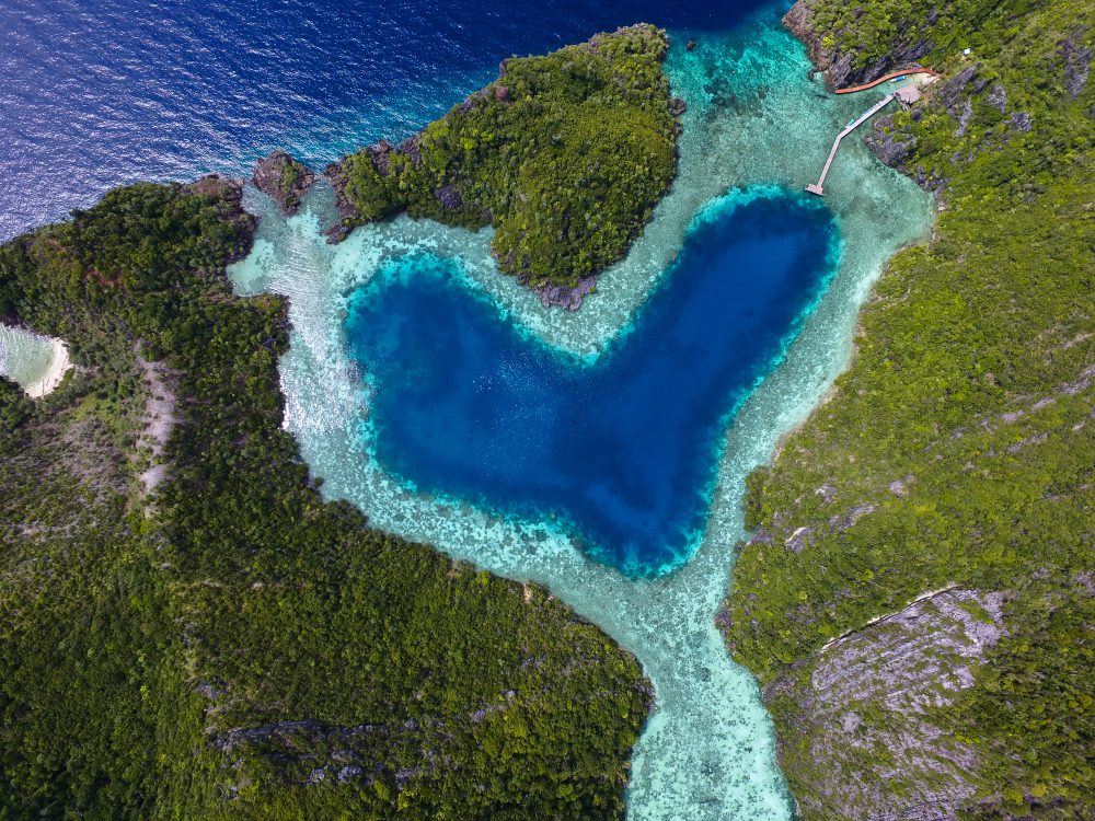 Aerial,Top,View,Of,Turquoise,Lagoon,In,Heart,Shape,